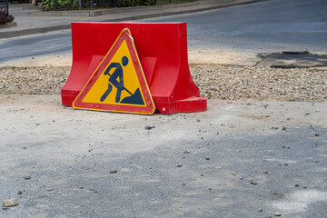 Road repair caution work in progress sign