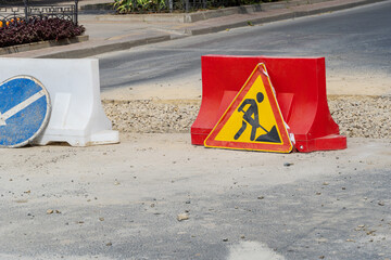 Road repair caution work in progress sign