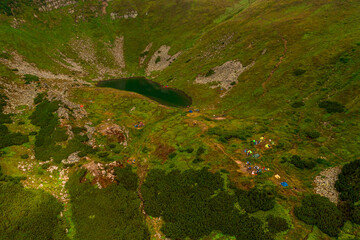 Carpathian lake Brebeneskul and rocky terrain near it, an attractive place for tourism, the highest lake of the Ukrainian Carpathians on the Montenegrin ridge.