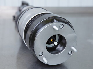 New car air suspension strut top support close up, pneumatic shock absorber for luxury armored...