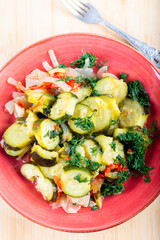 Zucchini Salad in dish on table. Fresh summer salad.