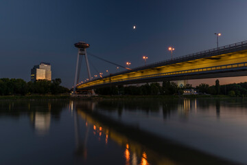 Fototapeta premium Bratislava capital in summer evening with color sunset and river Donau