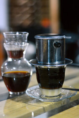 Close up Vietnamese drip milk and v60 coffee brewed manually
