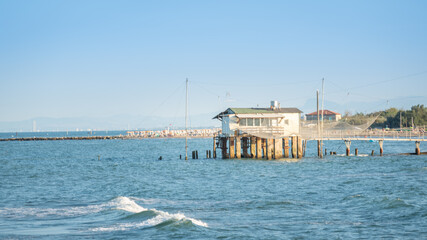 Fishing hut with typical italian fishing machine, called 