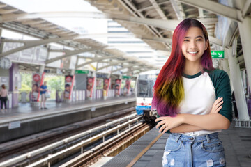 asian teenage street fashion with multi color long hair