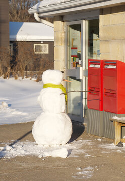Snowman at post office.