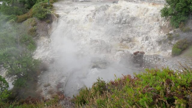 thermal pool from volcanic lake steaming in furnas Azores Portugal slow motion