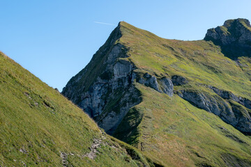 View to the mountain Laufbacher Eck in the Allgäu alps from Germany with hiker.