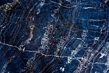 Drawing on a dark marble slab.