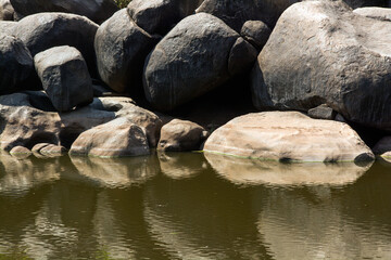 rock shape and reflection at hampi karnataka