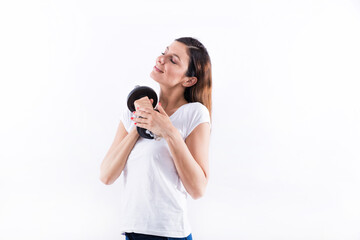 Fototapeta premium Young woman holding weight