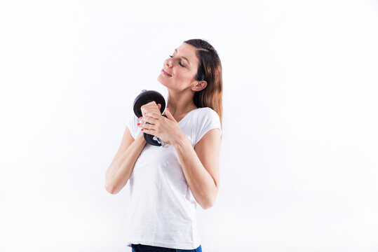 Young woman holding weight