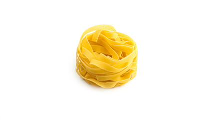 Uncooked fettuccine nest pasta on white background. High quality photo