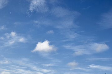Naklejka na ściany i meble Blue sky background with white high clouds Altostratus, Cirrocumulus, Cirrus.
