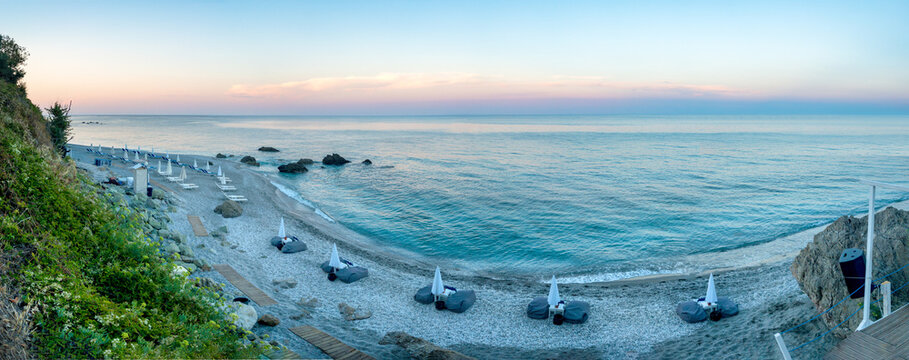 Panoramic view of a beach in Agiokampos, Greece at sunset.