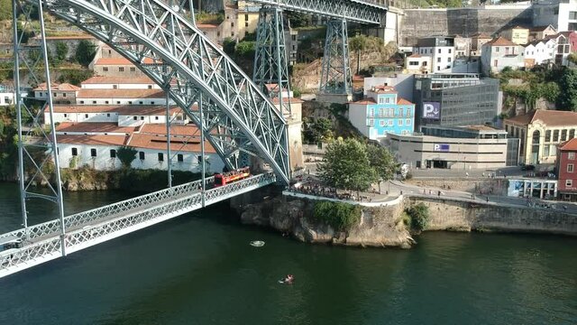 Eiffel bridge over river in Porto