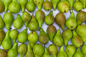 top down shot of pears in a market