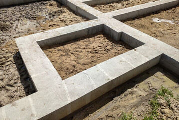 Concrete foundations for a residential building.