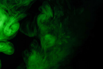 Green steam on a black background.