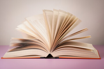 Close-up of open book on the table.