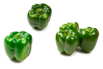 Group of green bell peppers isolated on white background. Top view.