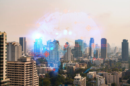 World planet Earth map hologram over panorama city view of Bangkok, Asia. The concept of international connections and business. Multi Exposure.