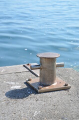 
metal element called "bollard" for mooring boats