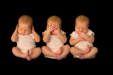 One baby photographed three times doing hear see speak no evil