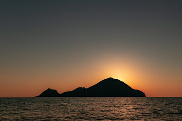 Naklejka na ściany i meble Sunset in Filicudi. Aeolian islands, Sicily.