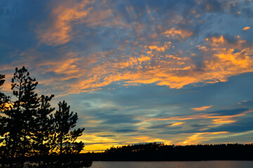 Fototapeta premium Beautiful fiery sunset. Lake Keret, Northern Karelia, Russia