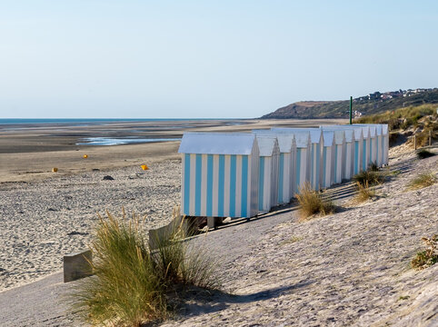 Striped beach cabins in Hardelot, France.