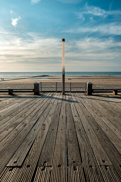 Street light near the beach of Ostend in Belgium against blue sky.