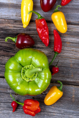 mix pepper variety harvest on a wood table