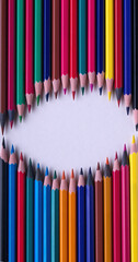 School supplies on blackboard background ready for your design. back to school. colourful crayons. colorful background