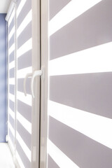 Obraz premium closed window or door with metal jalousie. Office meeting room lighting range control.