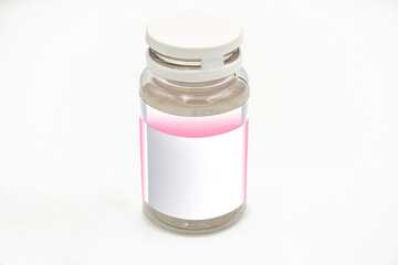 A pill bottle with white and pink label mockup, on a white background