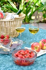 Fun summer setting for outdoor gourmet romantic date picnic in beautifully landscaped backyard for stay at home vacation 