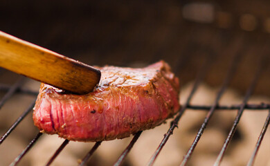 Delicious country raw pork steak on the grill