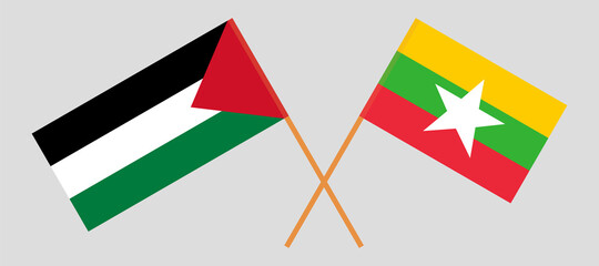 Crossed flags of Palestine and Myanmar