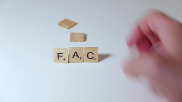 The letters from the word fake are eliminated to form the word fact,misleading information, myth busted