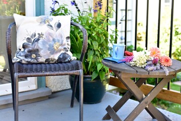 Relaxing outdoor balcony space for working from home or reading on warm seasonal days in summer...