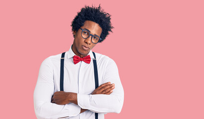 Handsome african american man with afro hair wearing hipster elegant look skeptic and nervous,...