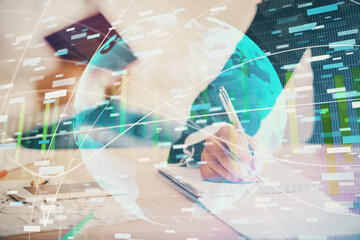 Double exposure of business theme drawing over people taking notes background. Concept of financial world