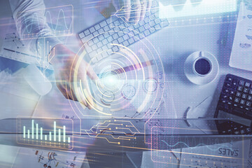 Double exposure of man's hands typing over computer keyboard and data theme hologram drawing. Top view. Technology concept.