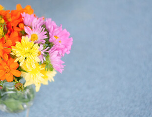 bouquet of wildflowers on the blue background