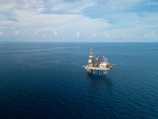 Aerial view from a drone of an offshore jack up rig at the offshore location during day time