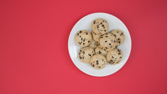 Stop Motion Animation of Filling and Emptying a Plate of Chocolate Chip Cookies