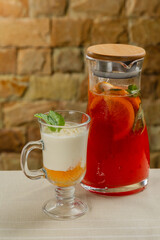 Fresh dessert with white chocolate in a transparent bowl.