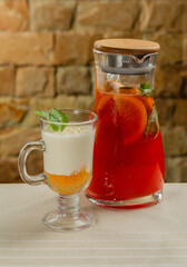 Fresh dessert with white chocolate in a transparent bowl.