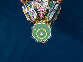 Aerial view from a drone of an offshore jack up rig at the offshore location during day time